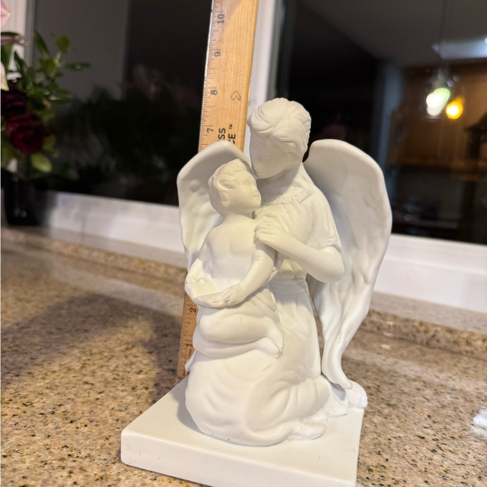 White Angel and kid Sculpture